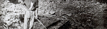 An African American Miner holding a shovel above a sluice box at Auburn Ravine, 1852