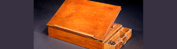 A photograph of the desk used by Thomas Jefferson when writing the Declaration of Independence, and for much of the rest of his life.